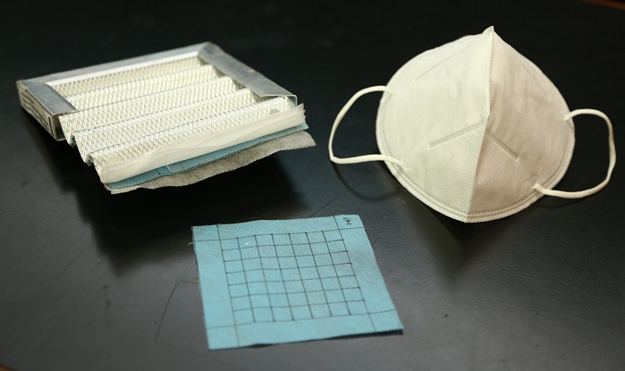 Mask fabricated with PolyU’s novel electrostatically charged PVDF nanofibre filter, and prototype of the composite filtration device containing the novel filter. © PolyU